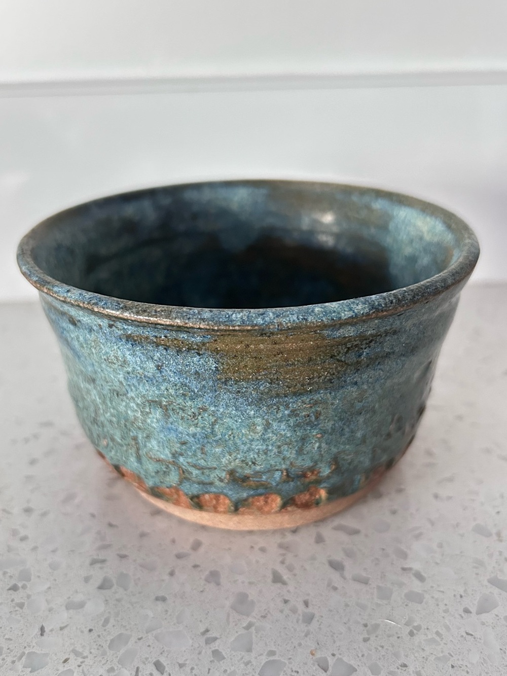 Pottery bowl with blue & brown glaze
